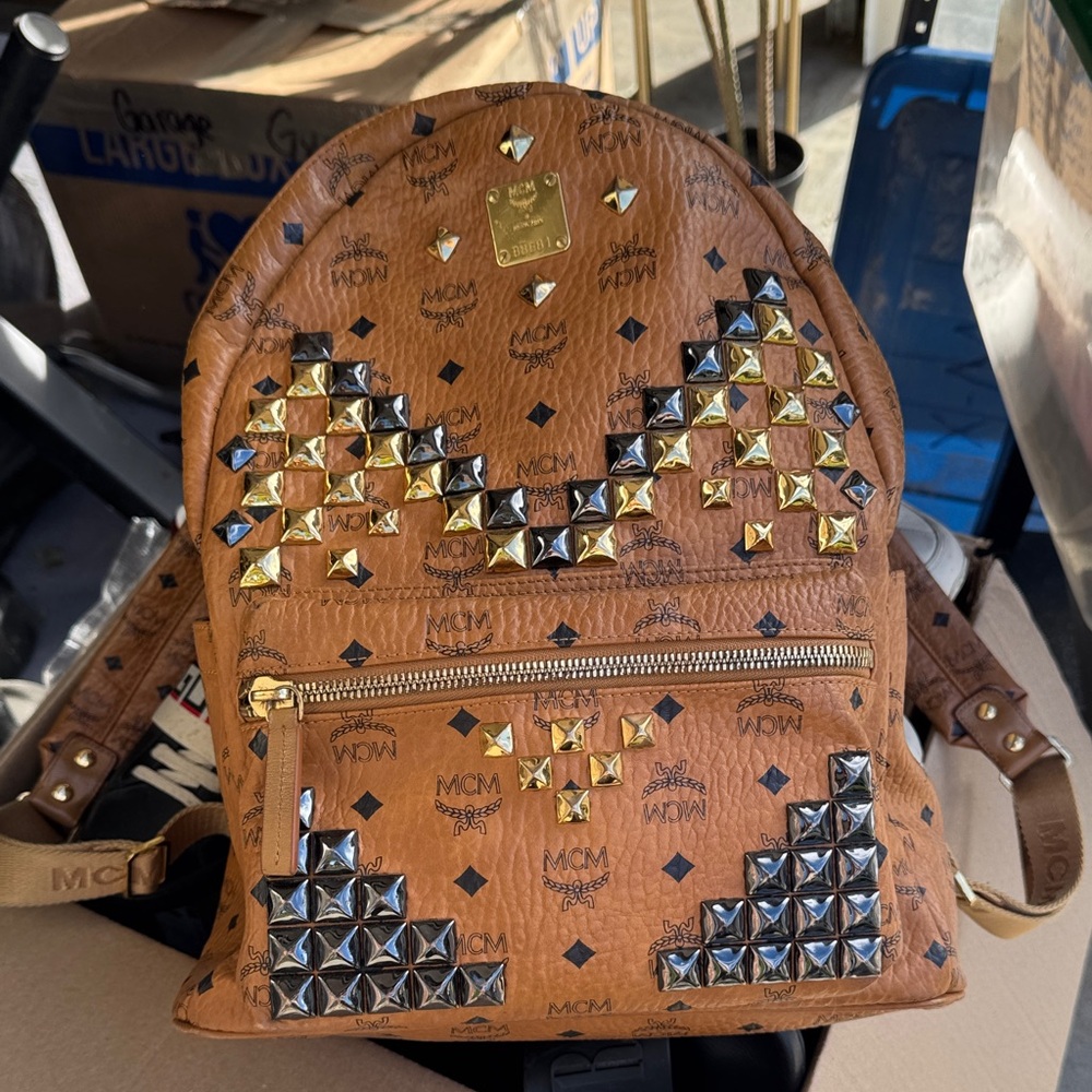 MCM Tan Backpack with Gold and Silver Studs
